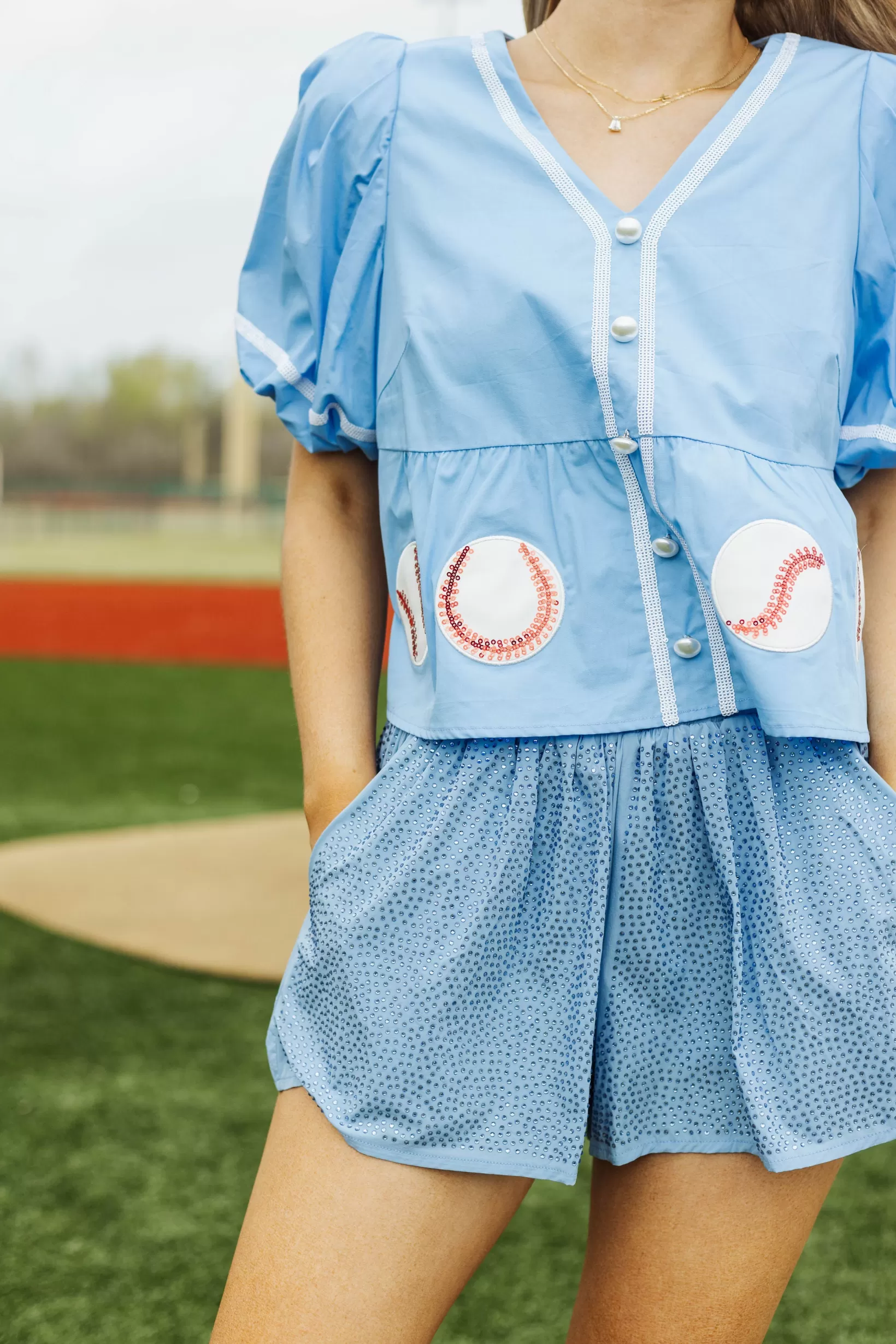 Store Queen of Sparkles Peplum Baseball Top Light Blue